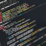 Monitor displaying lines of programming code